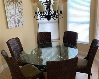 Glass and metal eat in table with 6 chairs $750 
 Table 60 round 30 tall
Chairs 42 tall 21 wide 20 deep