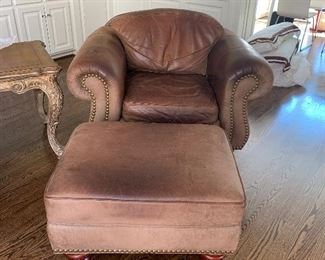 Oversized chair and ottoman with nailhead trim