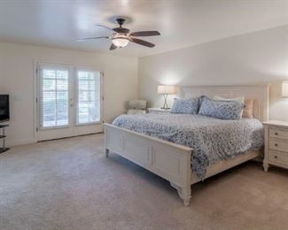 Master Bedroom: King Panel Bed, Dresser w Mirror, Wardrobe and 2 Nightstands, Table Lamps, TV and TV Stand