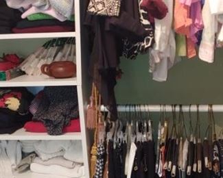 Large walk-in closet with ladies clothing size 10 and 12 and ladies shoes size 7 find top-notch clothing