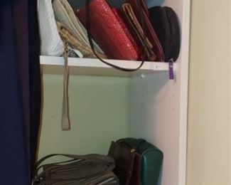 Large walk-in closets beautiful purses boots shoes jackets sandals and more