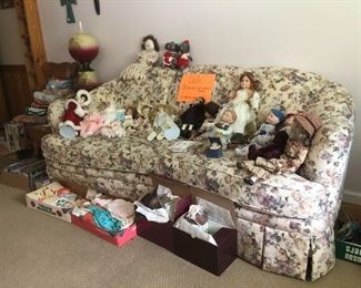 Couch full of dolls $10 each unless marked