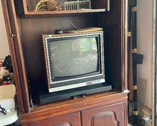 Old school TV and nice armoire.