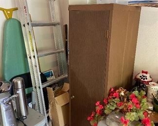 Ladder, storage cabinet.
