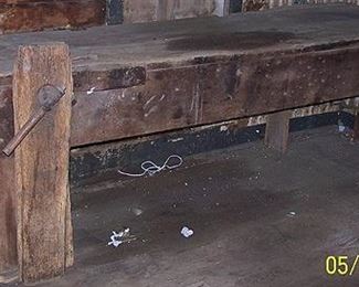 Primitive work bench w / vise   -   8 ft 10 in W  x 27 in. D x 33 in. H.
