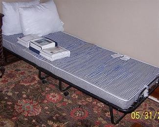 Roll-a-way bed. 