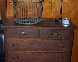 Four drawer oak dresser, metal two handle basket