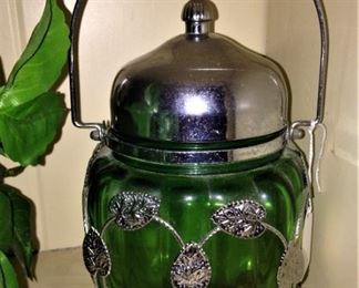 Beautiful green glass jar adorned with silver plate