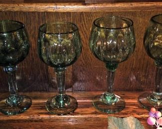 Four of six green glasses
