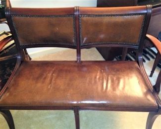 Handsome antique leather settee