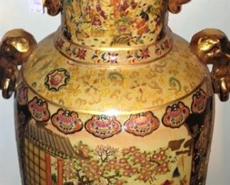 One of two large gold toned Asian temple vases - incredible details