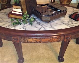 Oval coffee table with marble top