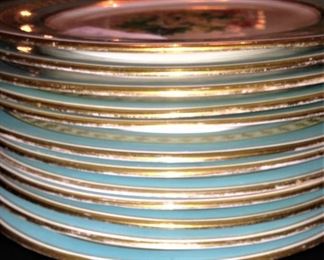 Each plate has a different flower (These are consigned and were purchased from the Gertrude Windsor estate.)