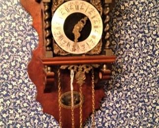 Unique antique clock with detailed top