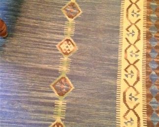 Large rug in pale blue tones