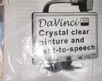 DAVINCI ENHANCED VISON $ 2000.00 FDaVinci is a high performance desktop video magnifier (CCTV), featuring Full HD, selective text-to-speech (OCR) and a 3-in-1 camera. With Full HD you will experience high definition color and contrast giving you a beautiful, crystal clear picture and vibrant colors. Experience the joy of reading with our new text-to-speech feature. DaVinci will read any printed text aloud with the push of a button.
DaVinci Sony® Full HD camera displays crystal clear images in vibrant color and contrast, resulting in the brightest white and deepest black. DaVinci’s high resolution LCD produces maximum levels of picture detail for a clear, bold display. Large field of view allows you to see more on the screen.
Give your tired eyes a rest with our text-to-speech (OCR) feature. Let DaVinci read your favorite article or book aloud. Simply place your printed text under the DaVinci camera and press a button; DaVinci will begin reading what is on the screen within a few se