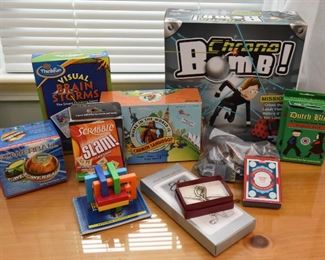 ITEM 5: Lot of Brain Games  $30
Visual Brain Storms, Chrono Bomb, Scrabble Slam, Powerball, Where in the World is Carmen Sandiego, Dutch Blitz, Minecraft magnets, Treasure Truck card deck, puzzles.