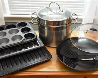 ITEM 14: Lot of Pots & Pans  $18
Broiling pans, muffin tins, stock pot with steamer insert, non-stick skillet with lid, two spatualas