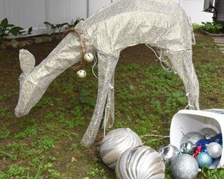 ITEM 43: Winter Yard Decorations  $18
Lighted, moving deer and several large ornaments