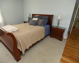 ITEM 61: Queen Sleigh Bed  $225
Does not include mattress and box spring