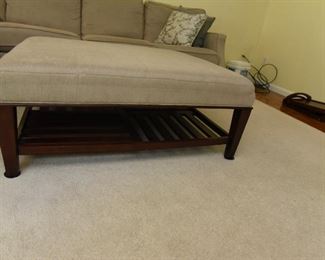 ITEM 70: Upholstered Coffee Table/Ottoman  $145
Upholstered with the same beige fabric as the sectional.
