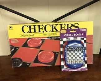ITEM 105: Checkers & Electronic Chess  $5