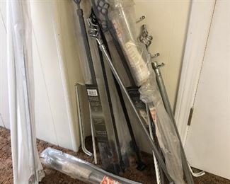 ITEM 134: Lot of Window and Curtain Hardware  $12