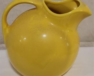 Lot# 2198 - Fiesta Yellow Pottery Pitcher