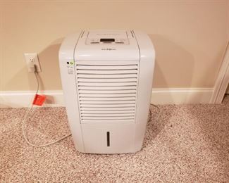 Frigidaire dehumidifier. Powers on.