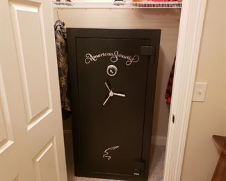 Large heavy-duty American Security gun safe. Combination is present and in full working condition. Shelfs on the interior are configurable for multiple rifle or hand gun sections. Measures 30 inches across and 59 in tall and approximately 30 in deep. Item is located in the basement and it is the bidders responsibility for removal of the safe. Reserve price is set to $750.