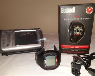 Bushnell Golf rangefinder watch and a Uniden scanner with base stand.