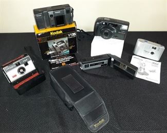3 different Kodak cameras, 1 Yashica and 1 Polaroid. Some have cases. Units have not been tested.