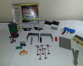 RR crossings, homes, cars and misc items to dress up your train set.