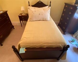 Like new twin size bed with beautiful headboard and matching bed frame.