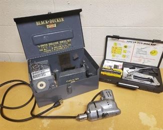 vintage Black & Decker utility quarter inch drill kit . light also includes staple gun. drill was plugged in and powers on but no additional testing was performed
