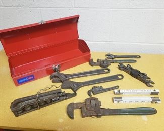 number 10 and number 14 Erie tool Works pipe wrenches. 3 crescent wrenches by the Crescent Tool Company of Jamestown New York. one small Ridgid pipe wrench. socket set by industrial manufacturing company in Chicago Illinois. newer red tool box included in the lot.