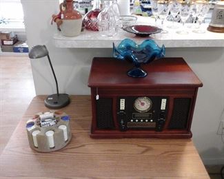 Poker chips, desk lamp, radio turntable and cassette player. 