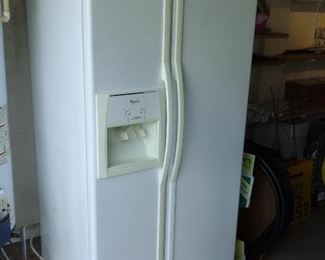 Nice side by side refrigerator with working ice and water in the door.