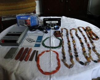 Realistic cassette player recorder like new in the box with unopened bag of cassette tapes,  Harley - Davidson safety eye ware, Cadmium ingot bar, Electrolytic copper bullion s and ingots, necklaces made from Jade, Jasper, White Onyx, Moss agate, Leopard Skin Jasper.  Carnelian Jasper and others