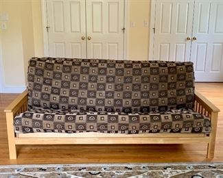 Item 38:  Convertible futon sofa - 79.5" x 32.5" x 31.5": $345