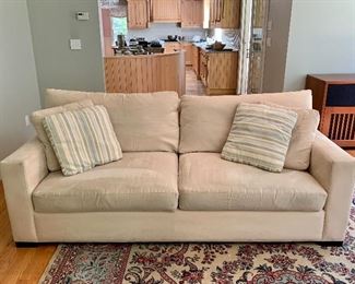 Item 49:  Crate & Barrel sofa with two custom Crate and Barrel Pillows - 87" x 30" x 31" tall: $600