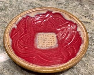 Garlic grater, pottery: $8