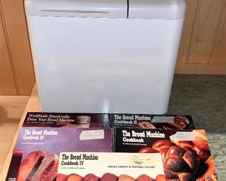 Item 252:  Bread maker & recipe cookbooks: $125