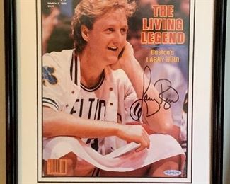 Item 84:  Authentic Sports Illustrated signed by Larry Bird - 12" x 16": $75