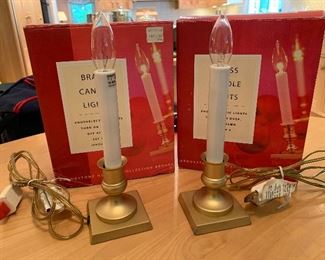 Item 271:  (24) Brookstone brass candle lamps: $50 