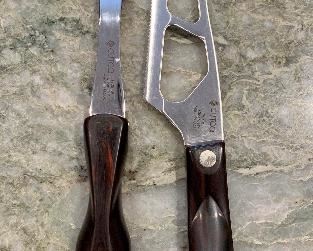 Item 274:  Cutco cheese knife and three pronged serving/turning fork: $68