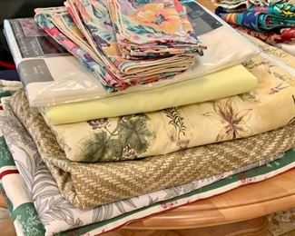 Item 278:  Lot of assorted size table clothes: $20
