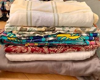 Item 279:  Lot of assorted size table cloths: $20