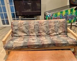 Item 136:  Convertible futon sofa - 79.5" x 32.5" x 31.5" tall" $245
