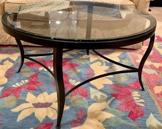 Item 143:  Iron & glass coffee table - 36" x 20": $245